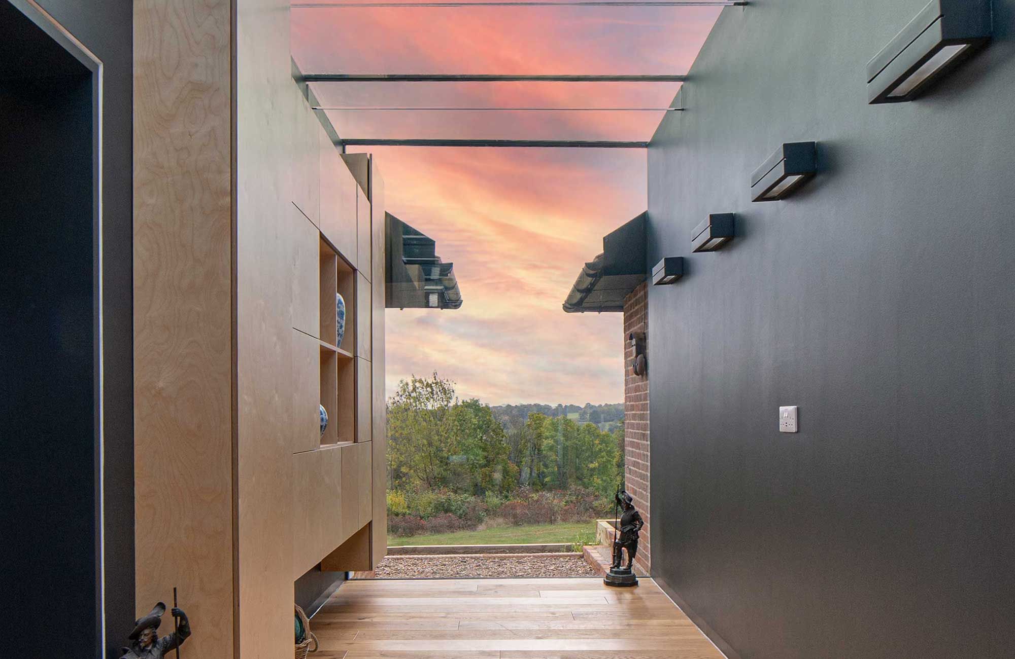 Entrance walkway at sunset, country house renovation