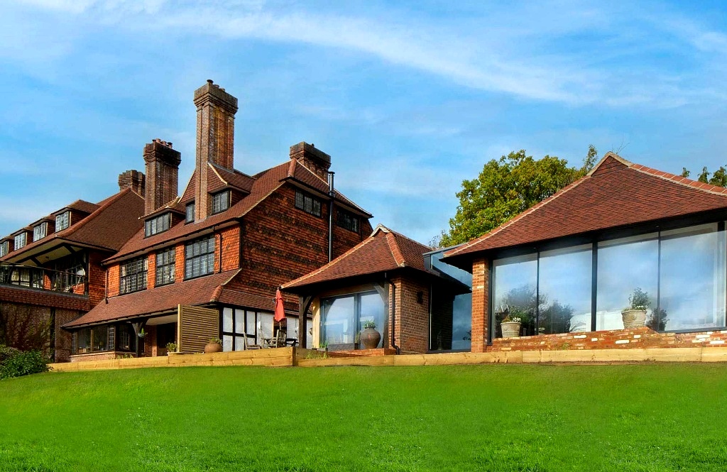 Period country house renovation with modern glass extension